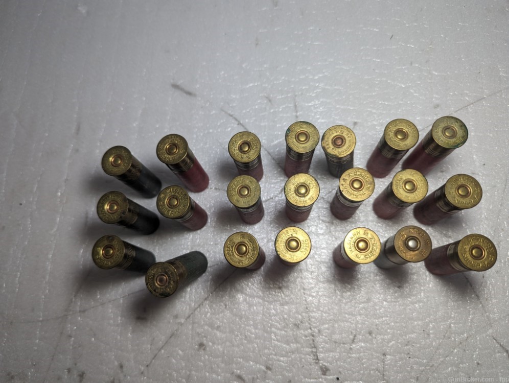 21 Assorted Winchester and Remington 16 gauge paper shotgun shells. -img-1