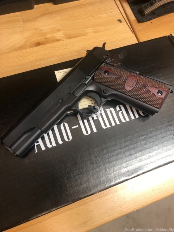 Auto-Ordinance 1911A1 blued #80 with wood grips-img-0