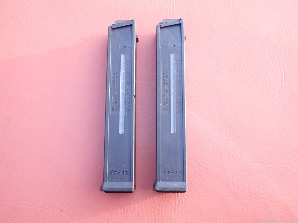 (2 TOTAL) HK UMP 45 FACTORY 45ACP 25RD MAGAZINE L.E. MARKED RESTRICTED-img-0