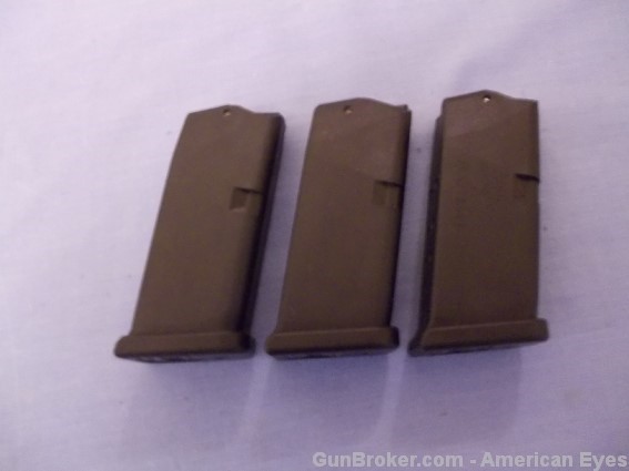 [3] Glock 27 Magazines 9rd 40sw Factory-img-0