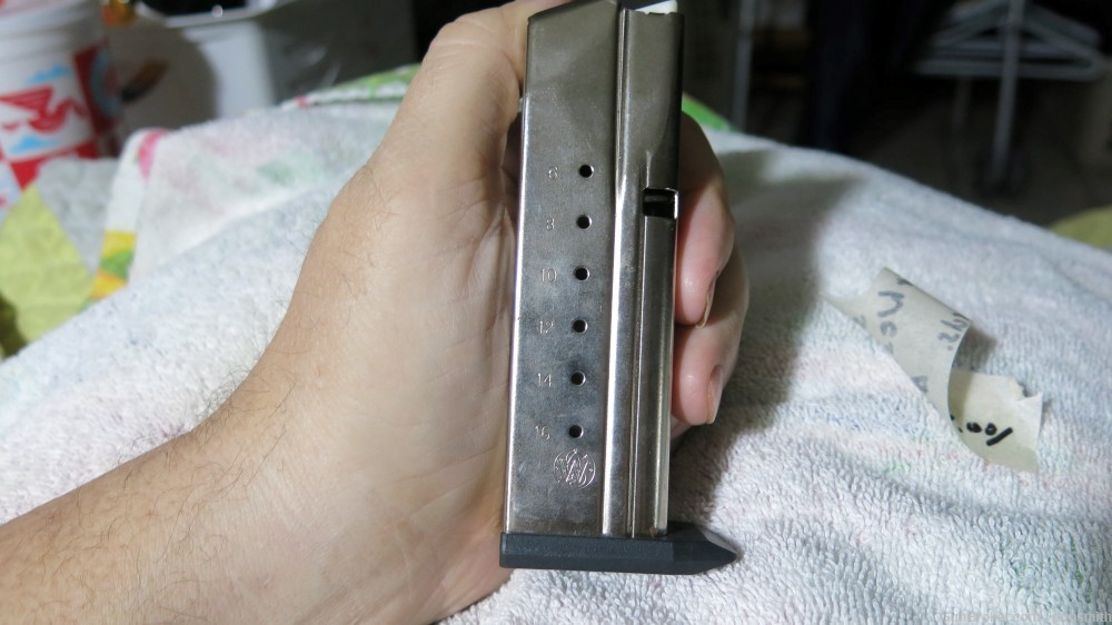 Smith and Wesson Sigma stainless factory 9mm 16rd pistol magazine-img-0