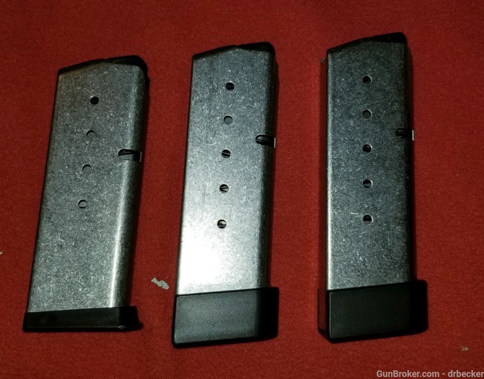 3 Kahr factory magazines for PM 45 one 5 round 2 are 6 round new factory -img-2