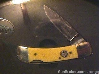Remington Limited EdiSportsman Series Knife and Tin Set, yellow bone handle-img-0