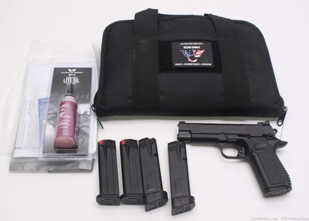 Wilson Combat SFT9 9mm w/ case and 4 extra magazines-img-0