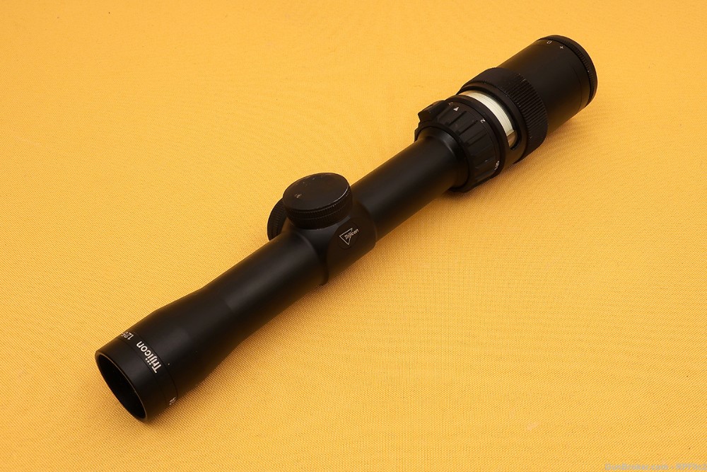 Trijicon 1.25-4x24 AccuPoint TR24G Rifle Scope - Green Dot -img-0