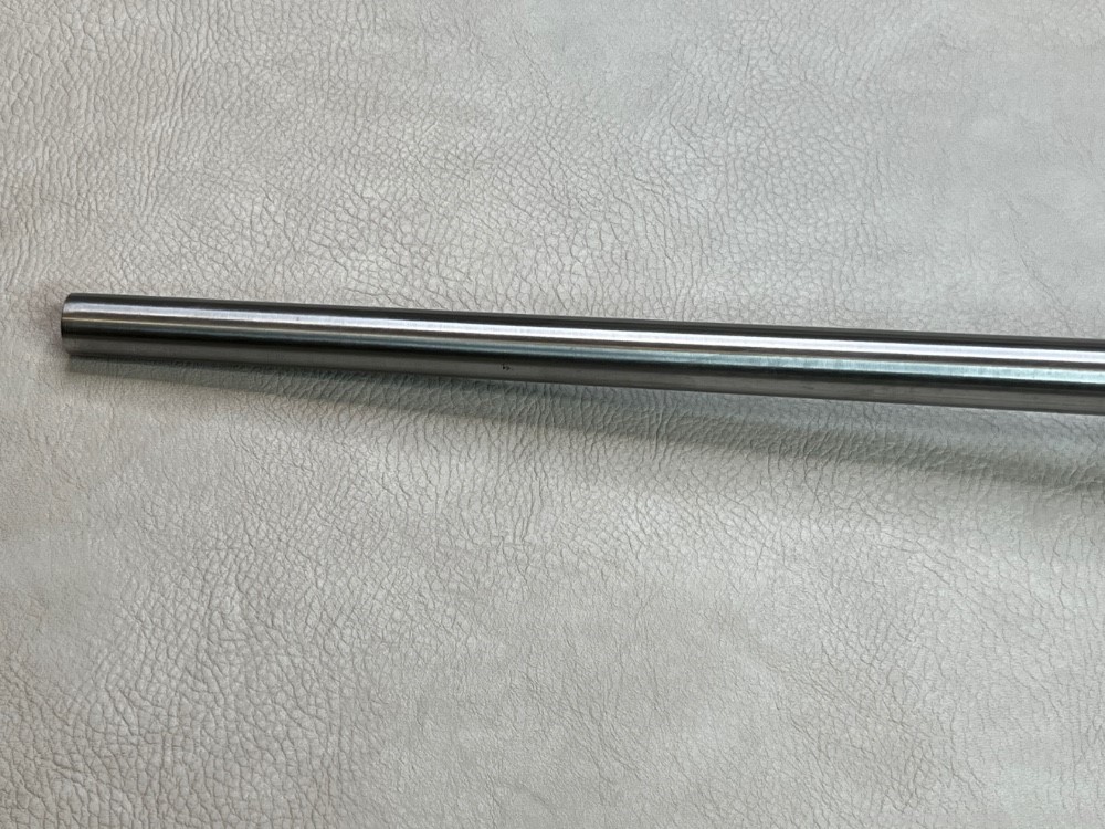 Ruger M77 MKII Stainless 7mm Rem Mag Zytel Paddle Stock w/Rings Made 1997-img-44
