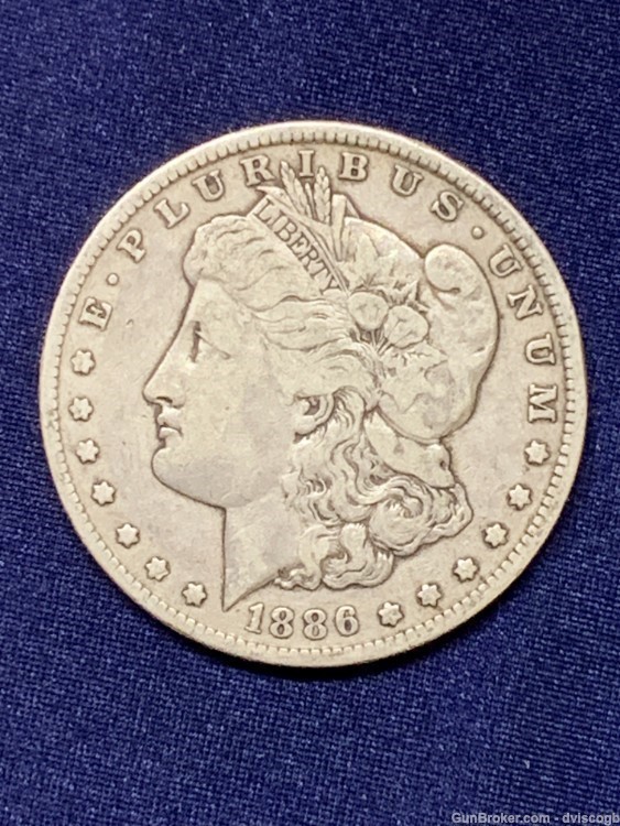 1886-O Morgan Silver dollar - F/XF detail -img-0