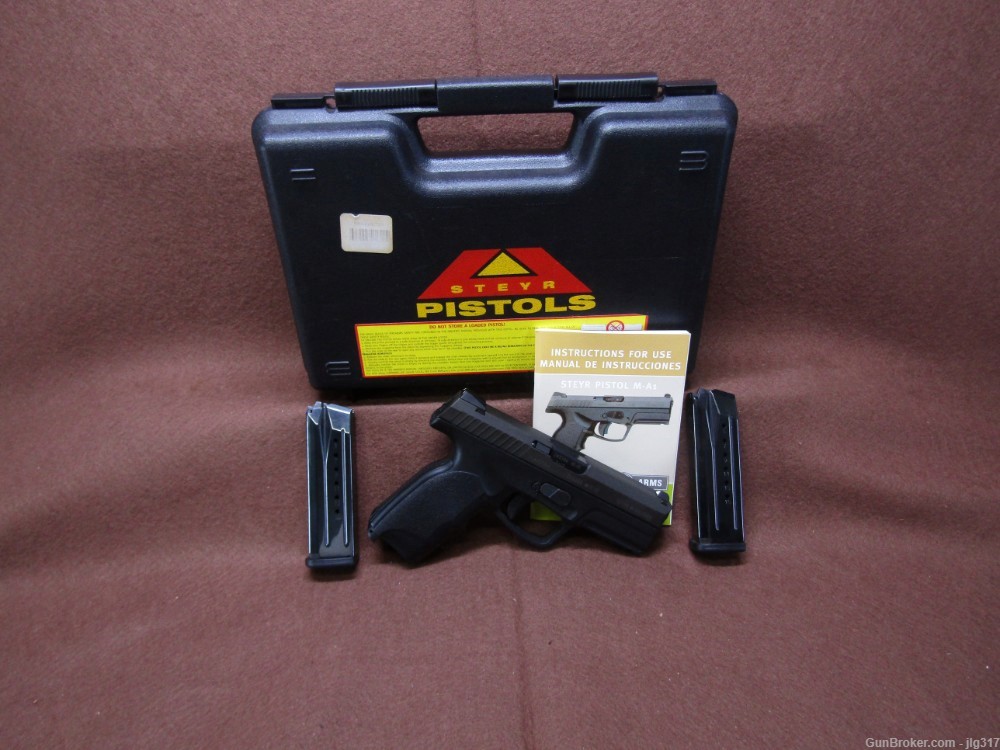 Steyr Mannlicher M9-A1 9 mm Semi Auto Pistol 2x 15 RD Mags-img-0