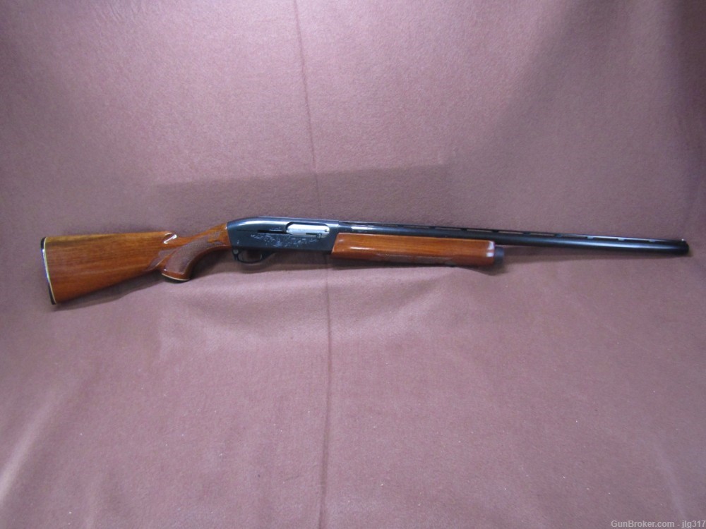 Remington 1100 12 GA 2 3/4 In Semi Auto Shotgun 25" Barrel-img-0