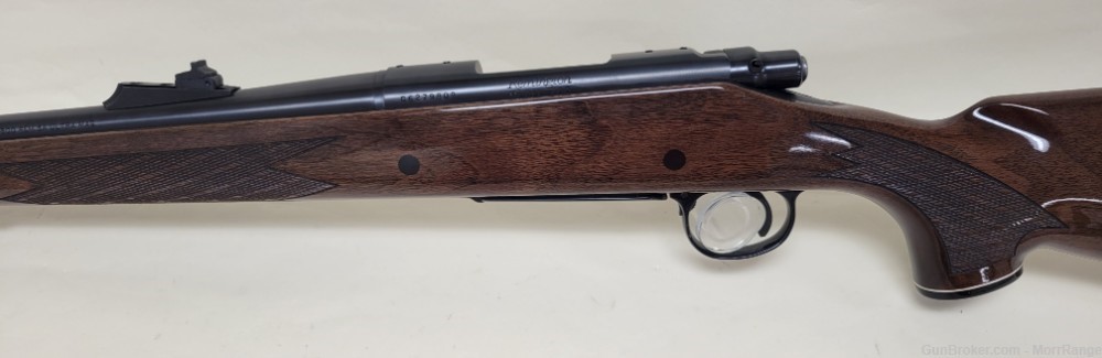 Remington 700 300 Rem Short Action Ultra Mag 24" Barrel Wood Stock-img-8