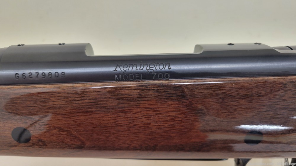 Remington 700 300 Rem Short Action Ultra Mag 24" Barrel Wood Stock-img-22