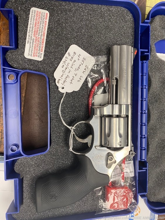 S&W 686-6 7 shot 4” stainless revolver. Mint -img-2