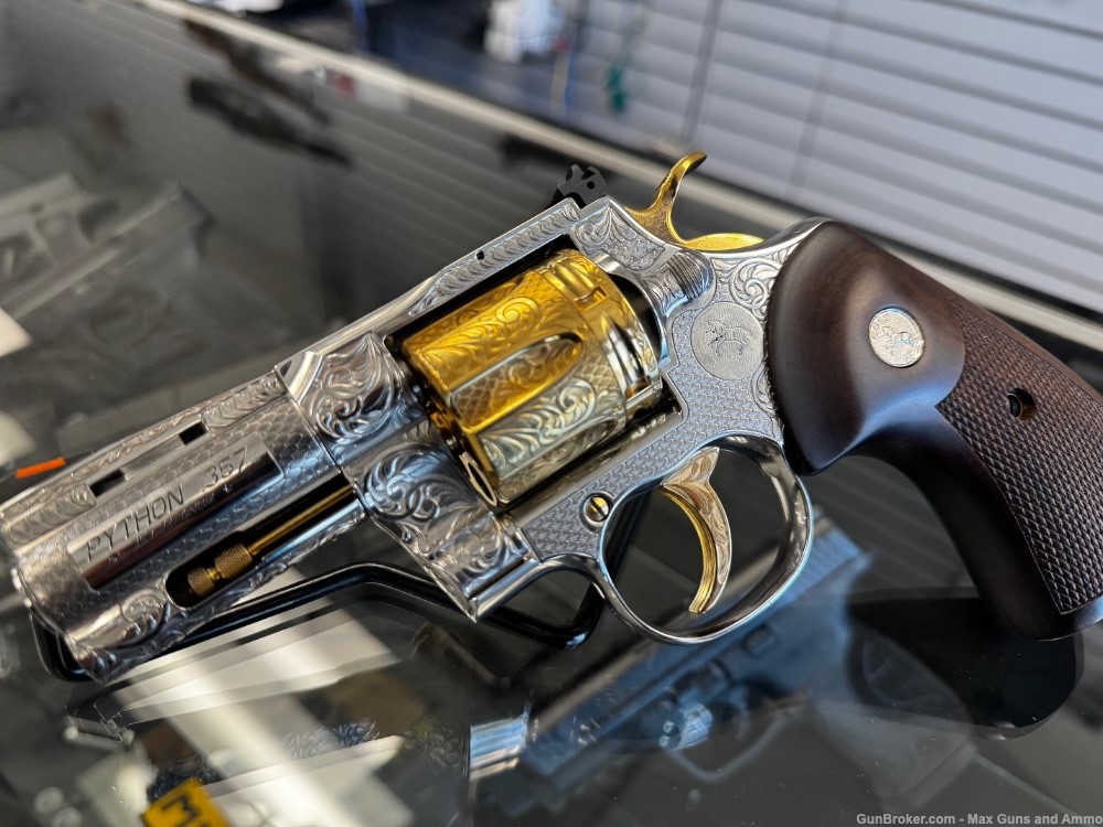 Colt Python .357 Fully Engraved with 24k Gold Plated accents-img-0