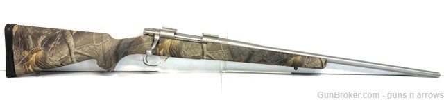 HOWA M1500 300 WSM 24" S/S barrel on camo stock new old stock -img-1