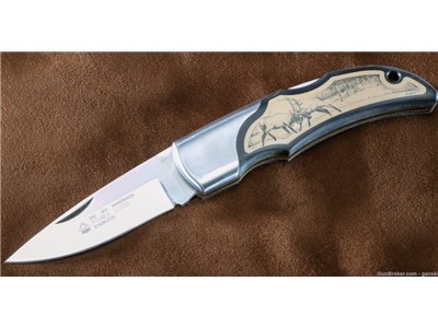 One of a kind Puma Lord scrimshaw folding knife