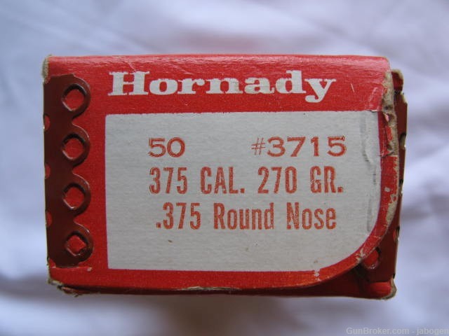 375 H+H bullets, 50 Hornady 270 grain round nose, tarnished.-img-0