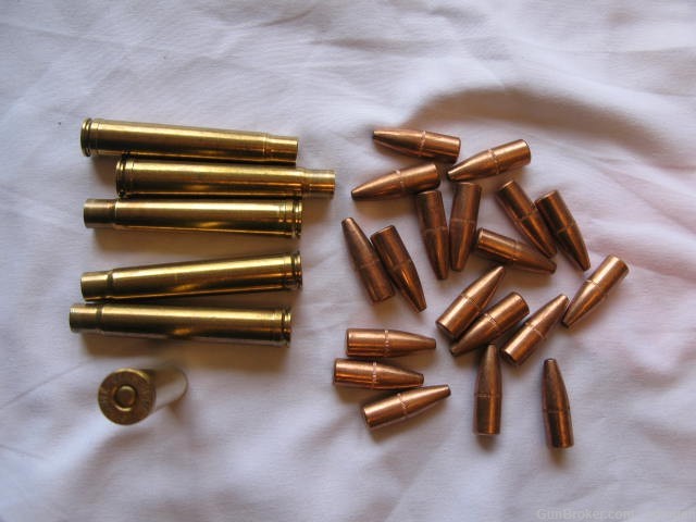 375 H+H primed once fired brass. Six cases and 18, 270 grain bullets-img-0