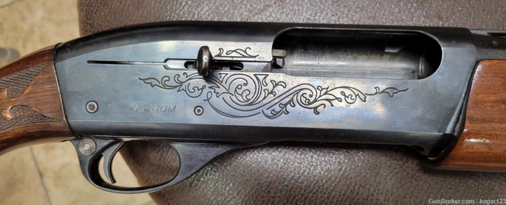 Remington 1100 12 Gauge Magnum Shotgun Engraved Blue -img-1