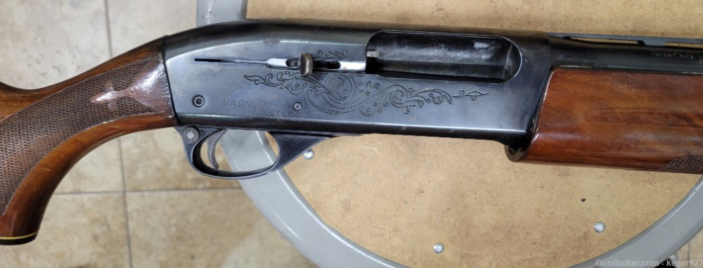 Remington 1100 12 Gauge Magnum Shotgun Engraved Blue -img-1