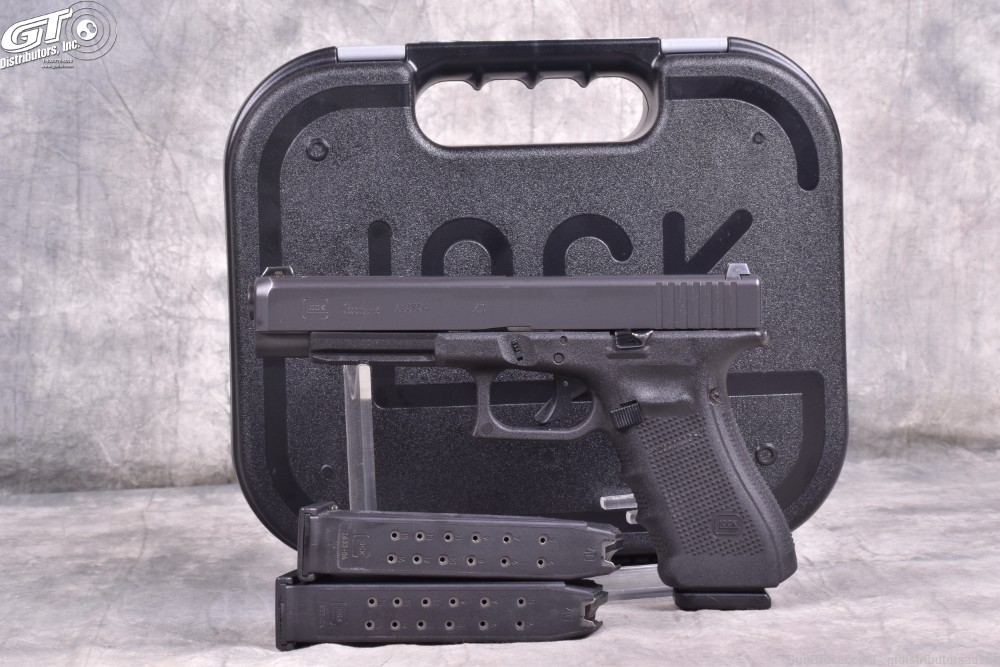 Glock Model 35 GEN 4 .40 S&W with three magazines and case-img-0