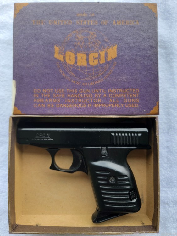 Lorcin L22 .22LR semi auto pistol, black w/orig box, like new-img-0