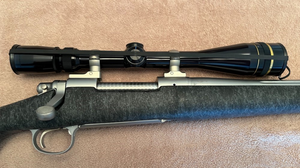Remington 700 in 7MM STW. Composite, Stainless, Fluted with Leupold 6.5X20-img-1