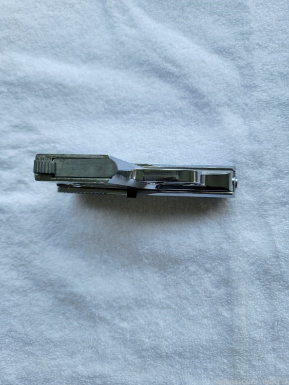 Raven MP-25 .25 acp semi auto pistol w/box, 3 sets of grips-img-6