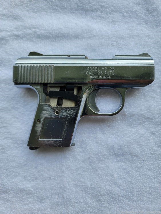 Raven MP-25 .25 acp semi auto pistol w/box, 3 sets of grips-img-3
