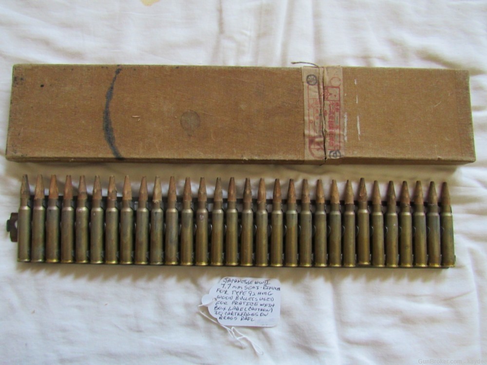 Japanese Vintage WWII Type 92 HMG Practice Wood Bullets Ammunition on Rail -img-0