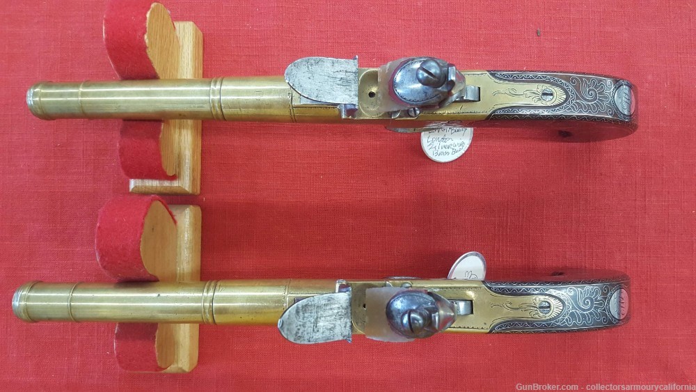 Cased Pair Of British Brass Barrel Turnoff Flintlock Boxlock Pistols-img-18