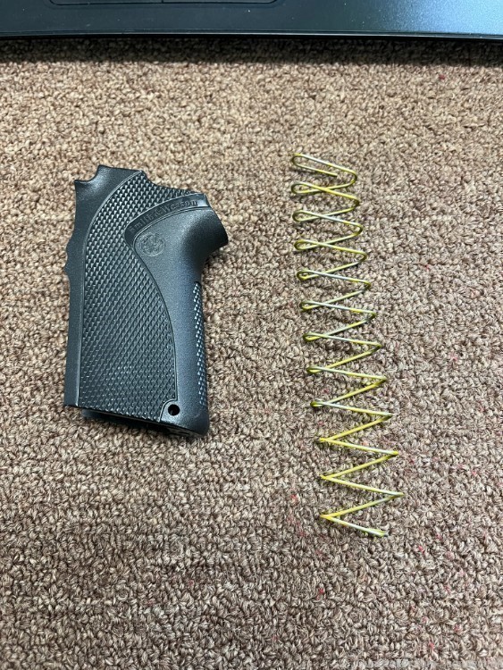 Smith and Wesson 457 Grip and Magazine Spring-img-0