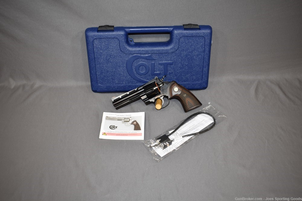 NiB - Blued Colt Python 4.25"- .357 Magnum Revolver w/ Factory Case-img-0