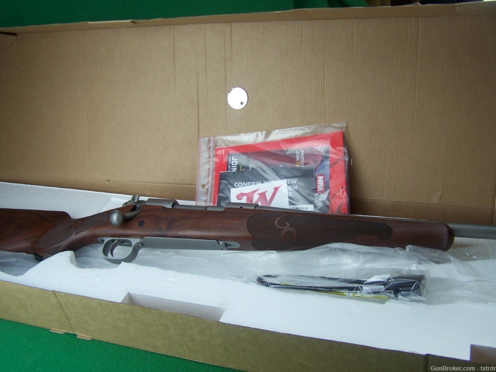AS NEW WINCHESTER 70 FEATHERWEIGHT, 300 WIN MAG, 24" STAINLESS, BOX & PPRS-img-0