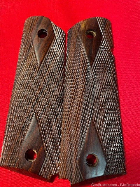 Two pair of new grips for 1911 style 45 acp pistols. Never mounted.-img-0