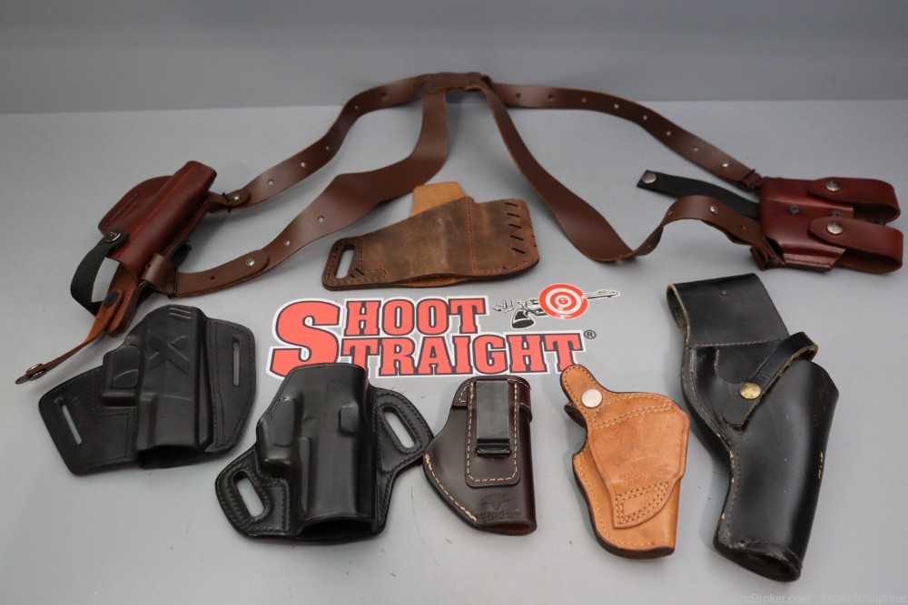 Box o' Seven Miscellaneous Leather Pistol Holsters-img-0