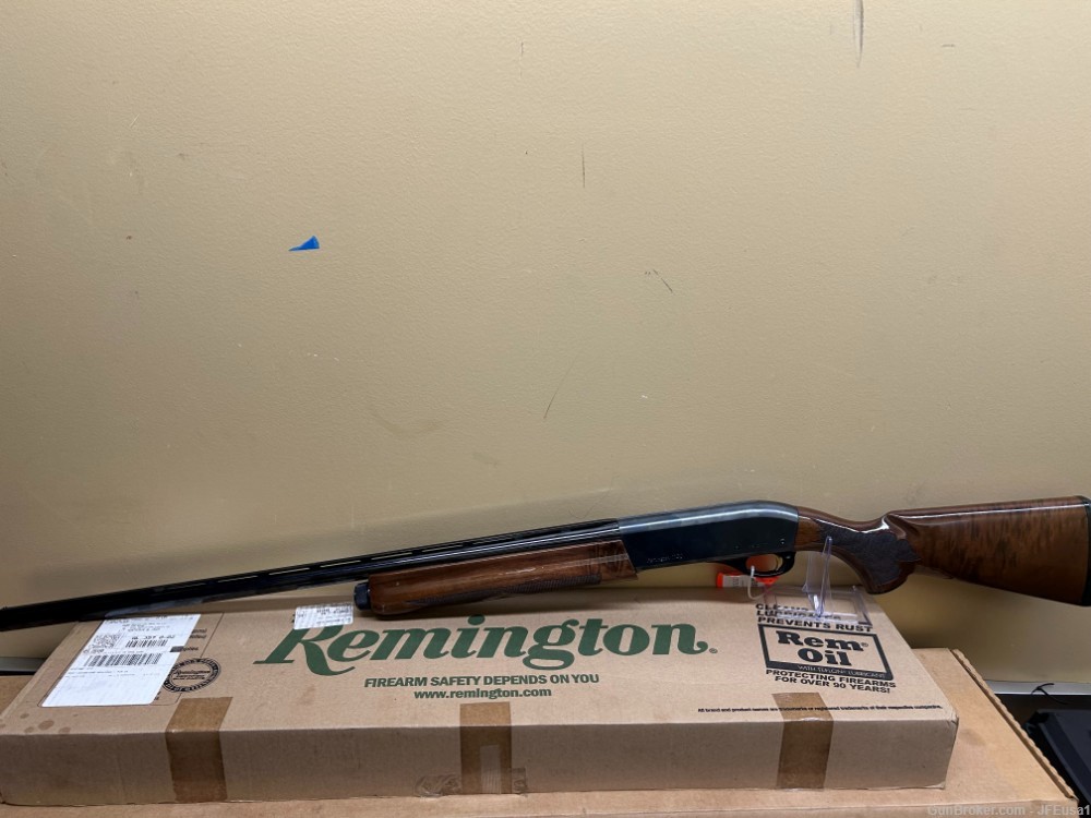 Remington 1100 sporting 12ga 28" Gloss furniture -img-1