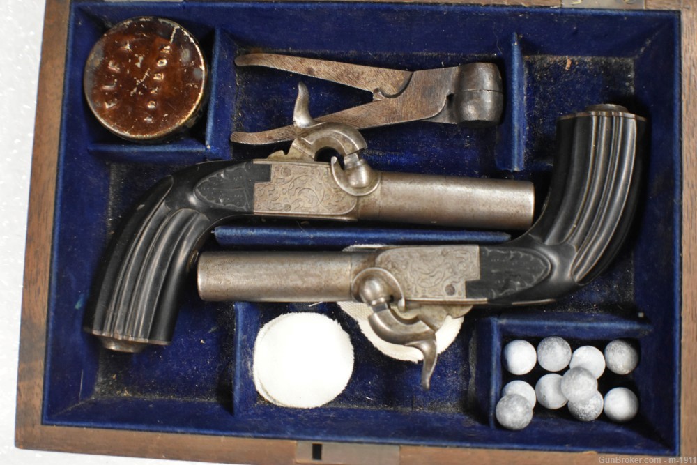 CASED PAIR BELGIAN PERCUSSION MUFF PISTOLS, MOLD, ELEY CAP TIN, NO RESERVE-img-0
