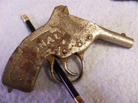 National Cap Pistol-All Cast Iron-1909-img-0