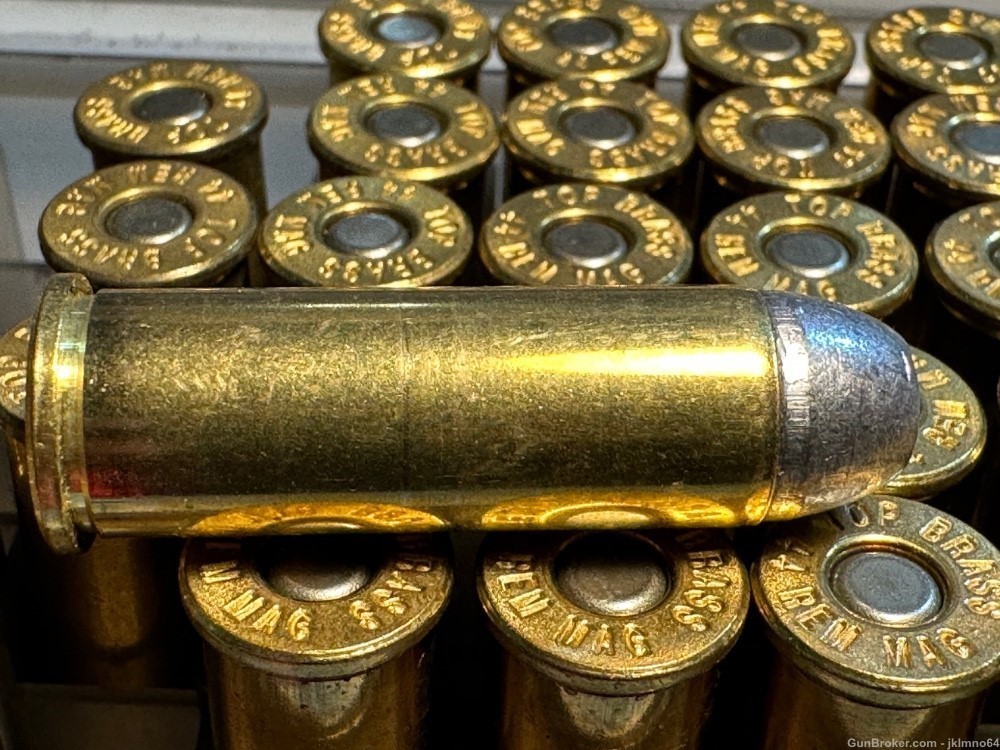 64 rounds of 44 Rem Remington Mag LRN and HP ammo and 17 spent brass cases-img-8