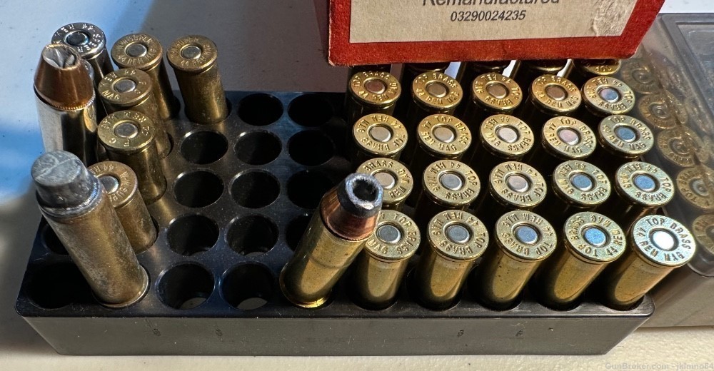 64 rounds of 44 Rem Remington Mag LRN and HP ammo and 17 spent brass cases-img-4