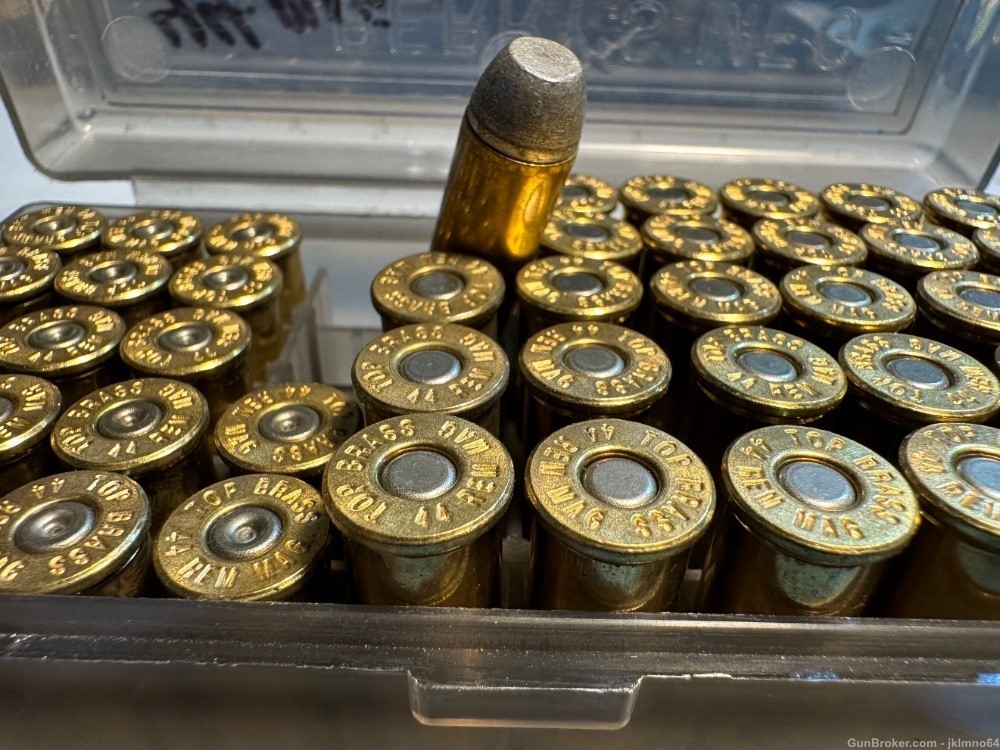 64 rounds of 44 Rem Remington Mag LRN and HP ammo and 17 spent brass cases-img-6