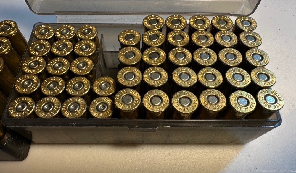 64 rounds of 44 Rem Remington Mag LRN and HP ammo and 17 spent brass cases-img-5
