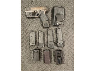Like new Battle Worn Cerakoted Glock 43 fully loaded with accessories 