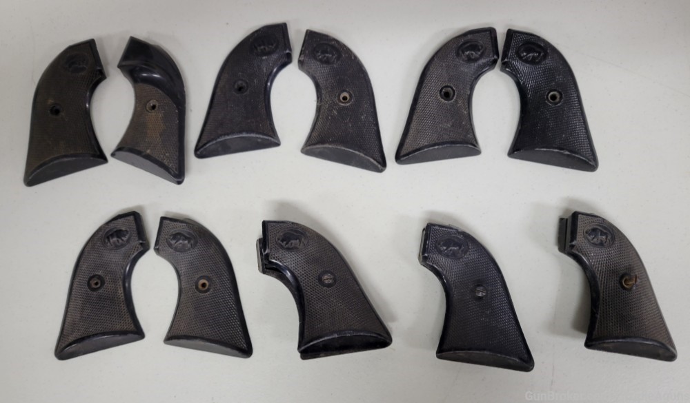 Lot of 7 unknown single action revolver black plastic grips -img-0