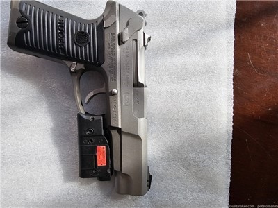 Ruger P89 9mm with laser aiming device and 2 magazines