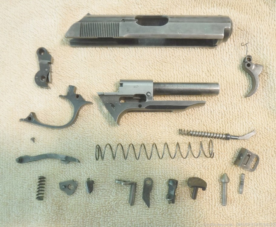 EARLY GERMAN WALTHER PPK 7.65MM PISTOL BLUED PARTS SET.-img-0