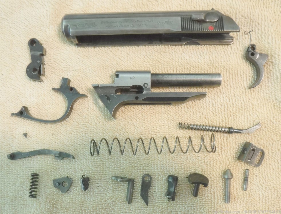 EARLY GERMAN WALTHER PPK 7.65MM PISTOL BLUED PARTS SET.-img-1