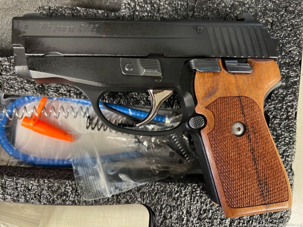 sig p239 357 sig with 40s/w barrel.case wood grips, ss trigger-img-4