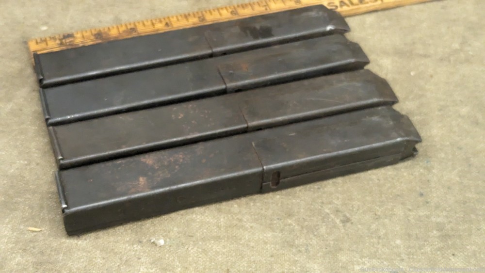 4 SMG or pistol 9mm magazines,   -img-0