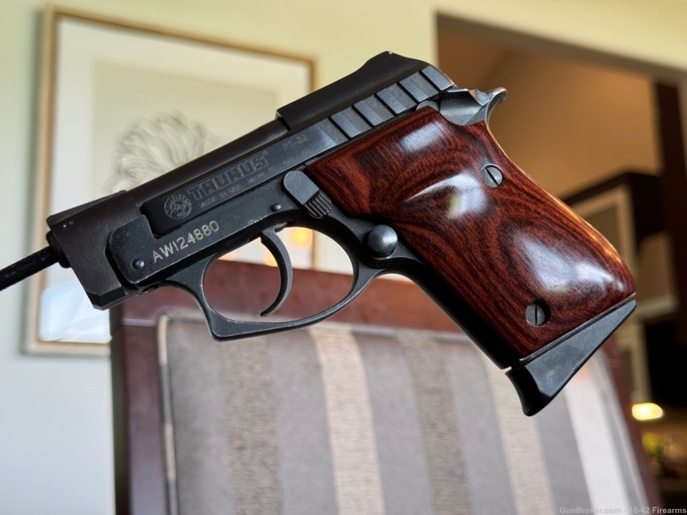 Taurus PT-22 Pistol with Rosewood Grips-img-0